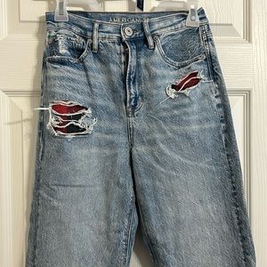 American Eagle ripped jeans with flannel patches